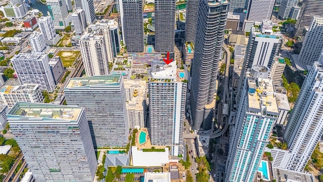 birds eye view of property featuring a view of city