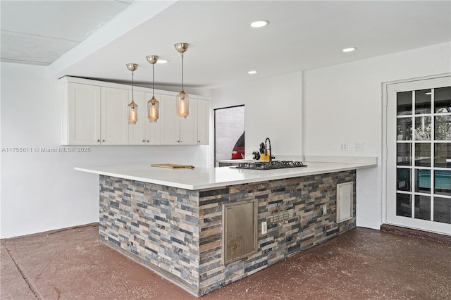 bar featuring recessed lighting and hanging light fixtures