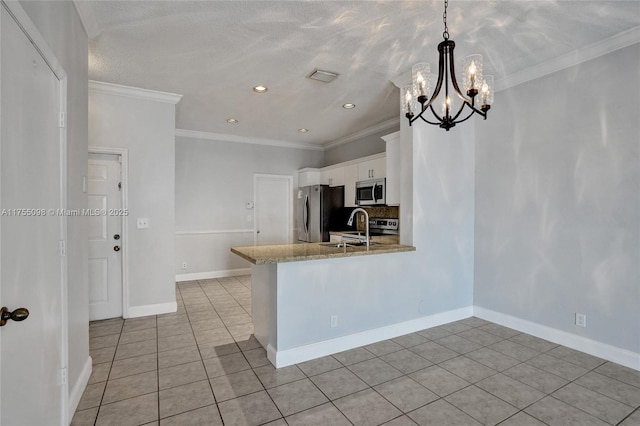 kitchen featuring crown molding, light tile patterned floors, visible vents, appliances with stainless steel finishes, and white cabinetry