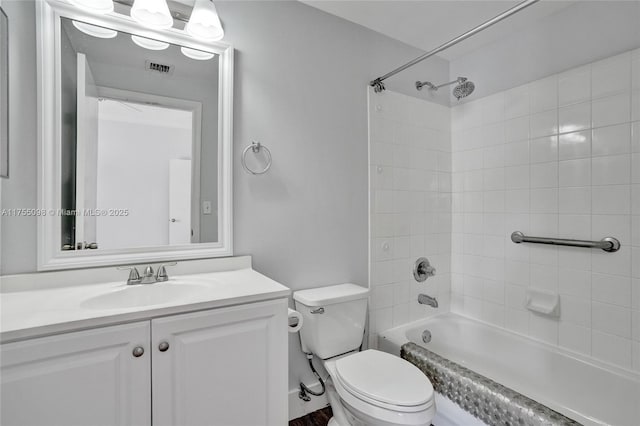 full bathroom featuring toilet, shower / bathing tub combination, visible vents, and vanity