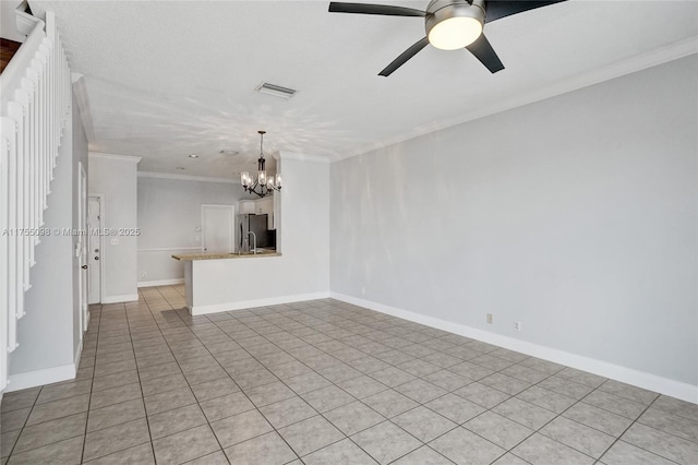 unfurnished living room featuring baseboards, visible vents, crown molding, and ceiling fan with notable chandelier