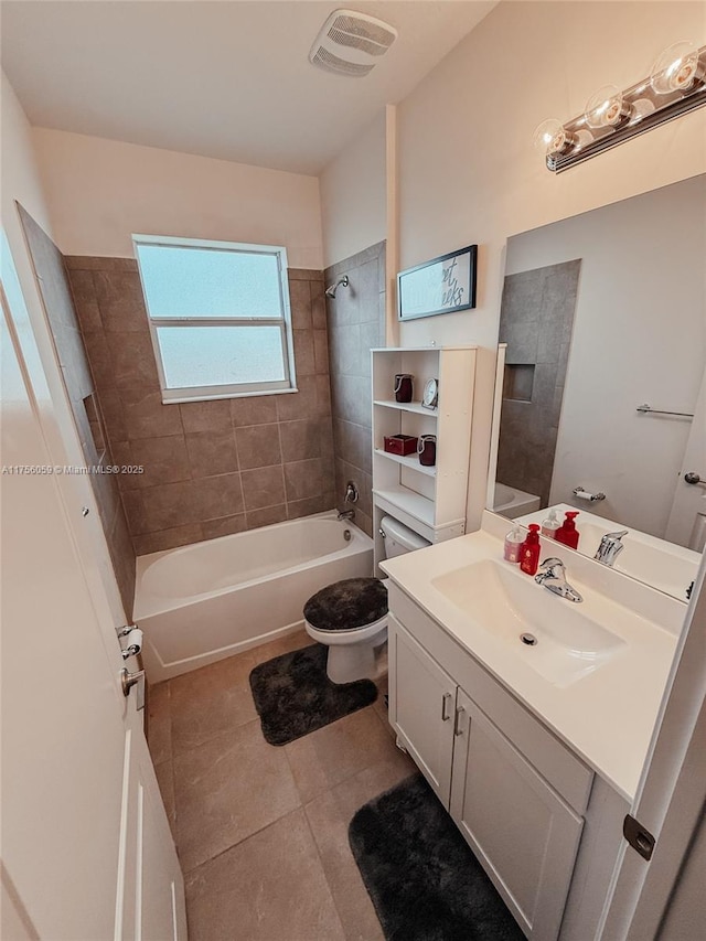 full bathroom featuring tile patterned flooring, toilet, visible vents, vanity, and bathing tub / shower combination