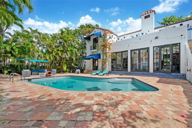 view of pool with a patio area and a fenced in pool