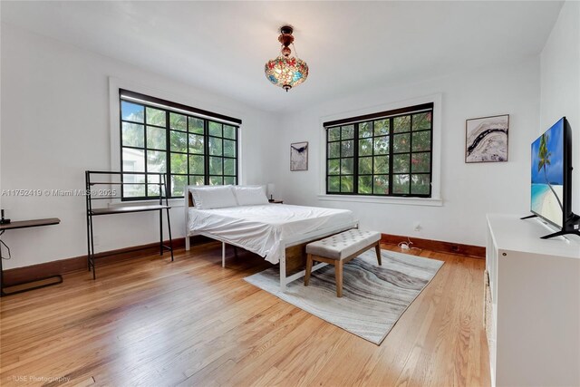 1624 Granada Blvd, Coral Gables, FL 33134 - bedroom featuring multiple windows and wood finished floors