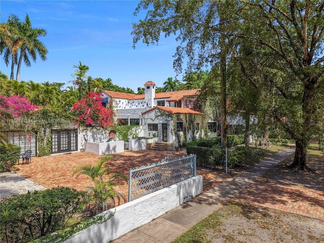1624 Granada Blvd, Coral Gables, FL 33134 - mediterranean / spanish house featuring french doors