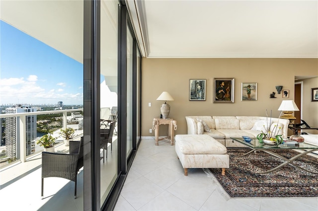 living area featuring light tile patterned floors, a city view, and crown molding