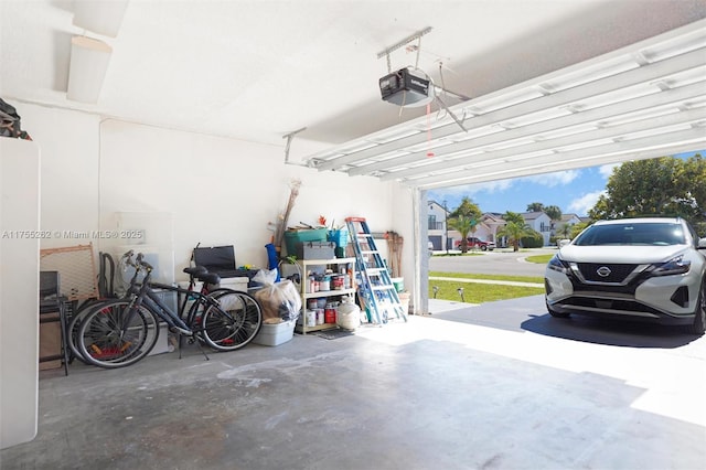 garage featuring a garage door opener