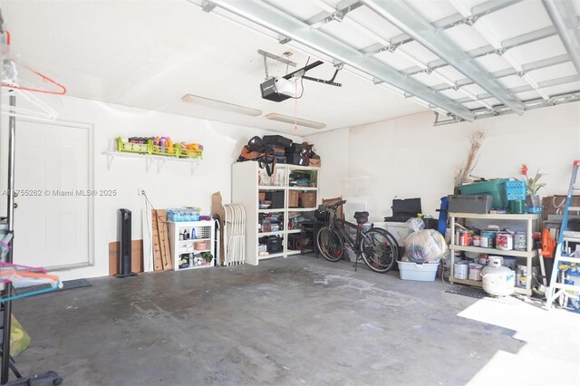 14421 SW 116th Ter, Miami, FL 33186 - garage featuring a garage door opener