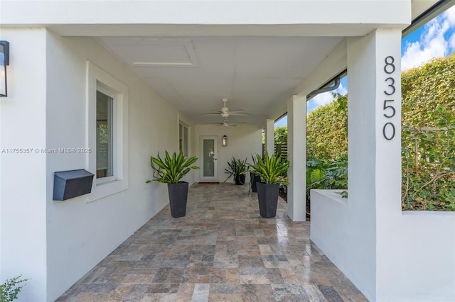 view of patio / terrace with ceiling fan