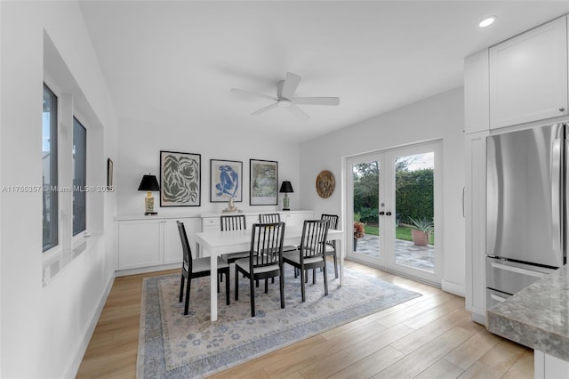 dining space featuring light wood finished floors, ceiling fan, french doors, and recessed lighting