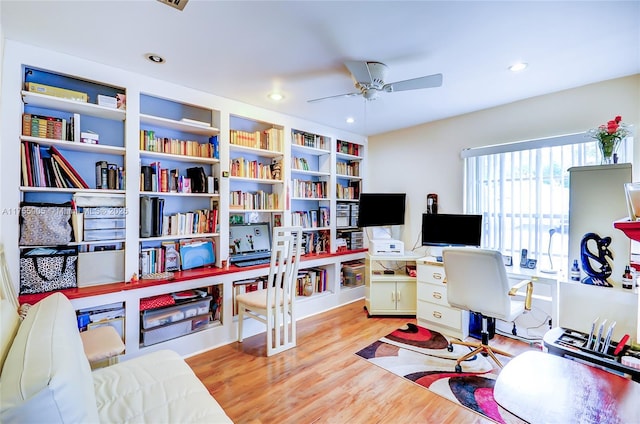 home office featuring ceiling fan, wood finished floors, and recessed lighting