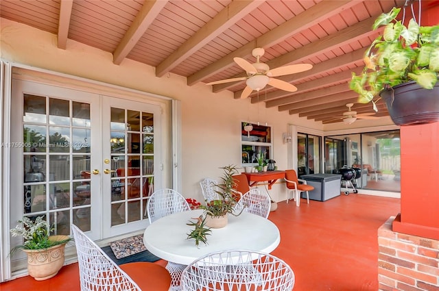 view of patio featuring french doors and a ceiling fan