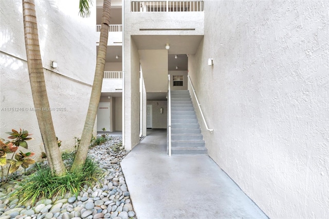 property entrance featuring stucco siding