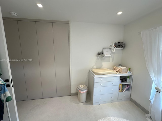 bedroom with baseboards and recessed lighting