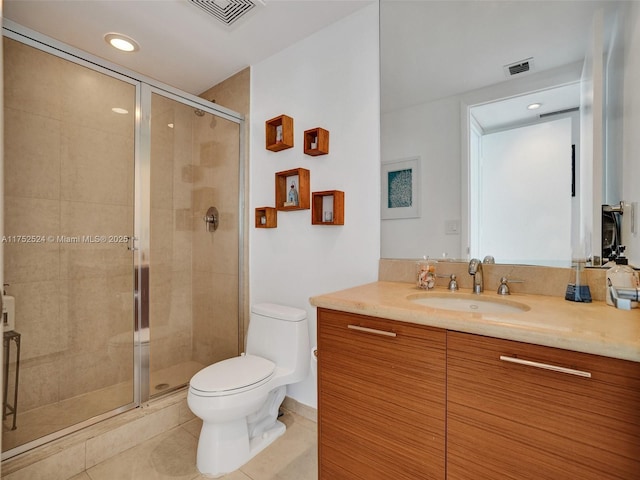 bathroom featuring a stall shower, tile patterned flooring, visible vents, and toilet