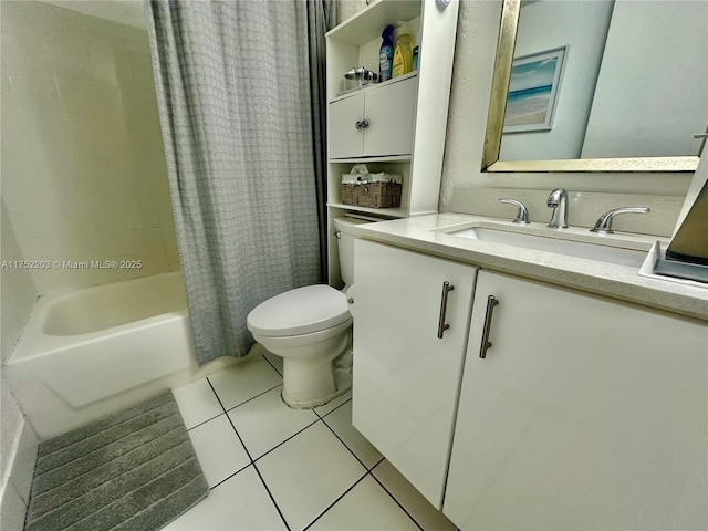 bathroom with shower / bath combination with curtain, tile patterned flooring, vanity, and toilet