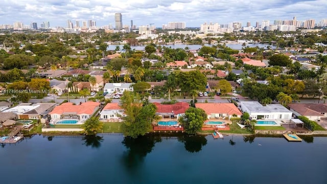 drone / aerial view with a view of city and a water view