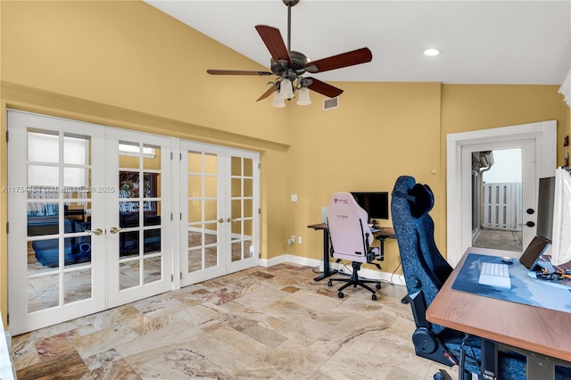 office area with a ceiling fan, french doors, vaulted ceiling, and baseboards