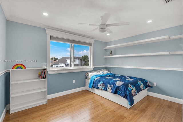 bedroom featuring recessed lighting, wood finished floors, a ceiling fan, and baseboards