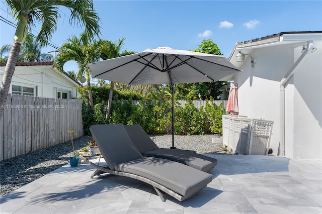 view of patio / terrace with fence