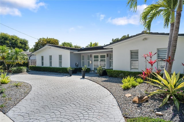 view of front of home featuring stucco siding