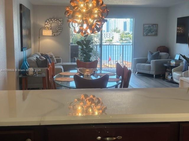 dining space with a chandelier