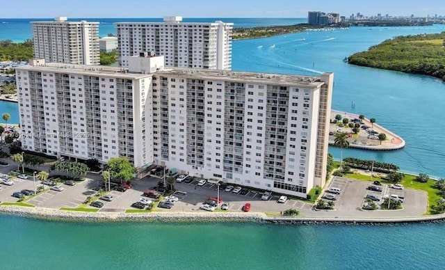 aerial view featuring a view of city and a water view