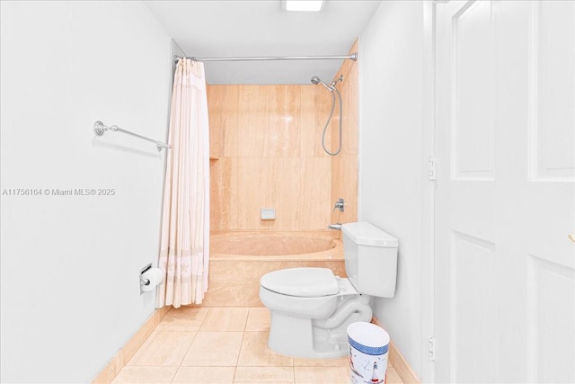 full bathroom featuring tile patterned flooring, toilet, and shower / tub combo with curtain