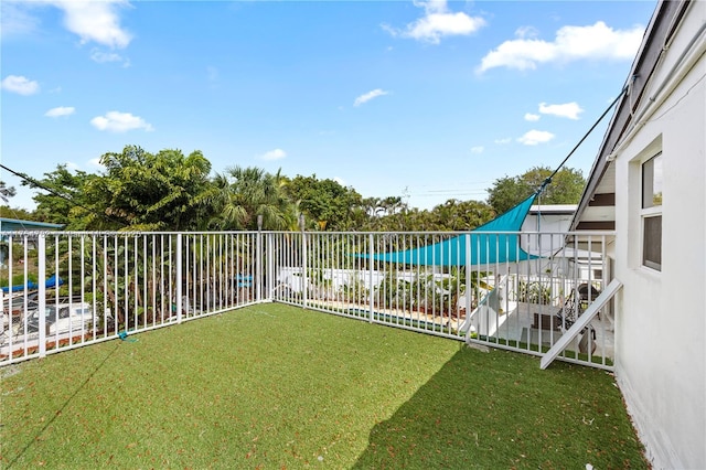 2413 Sugarloaf Ln, Fort Lauderdale, FL 33312 - view of yard with fence and a balcony
