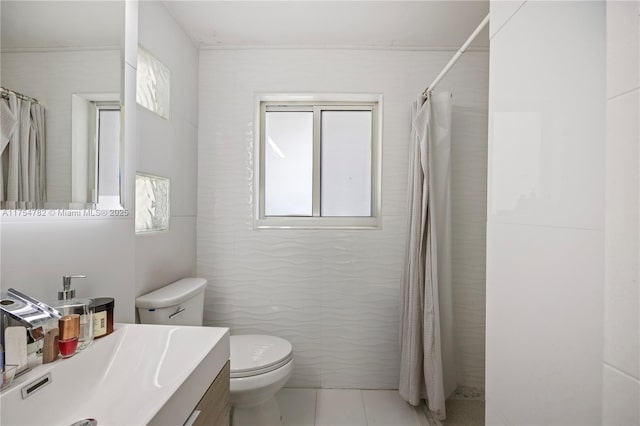 2413 Sugarloaf Ln, Fort Lauderdale, FL 33312 - bathroom with vanity, toilet, tile patterned floors, tile walls, and tiled shower