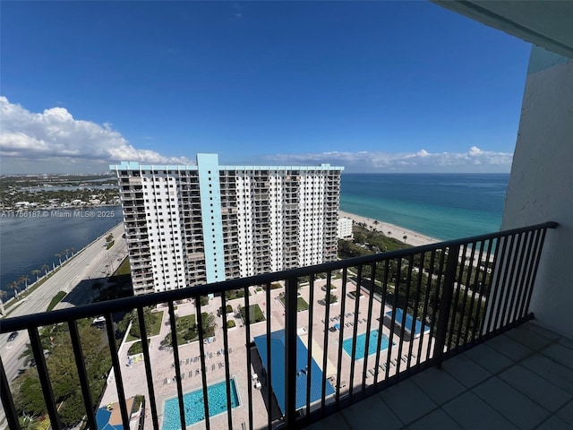 balcony featuring a water view