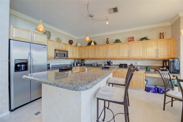 kitchen featuring light brown cabinets, stainless steel appliances, visible vents, backsplash, and crown molding