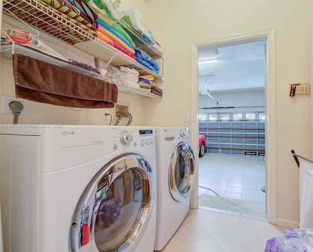 7800 NW 29th St, Margate, FL 33063 - laundry room with washing machine and dryer, laundry area, and light tile patterned floors