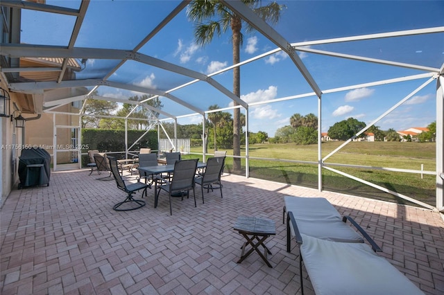 7800 NW 29th St, Margate, FL 33063 - view of patio with outdoor dining space, grilling area, and a lanai