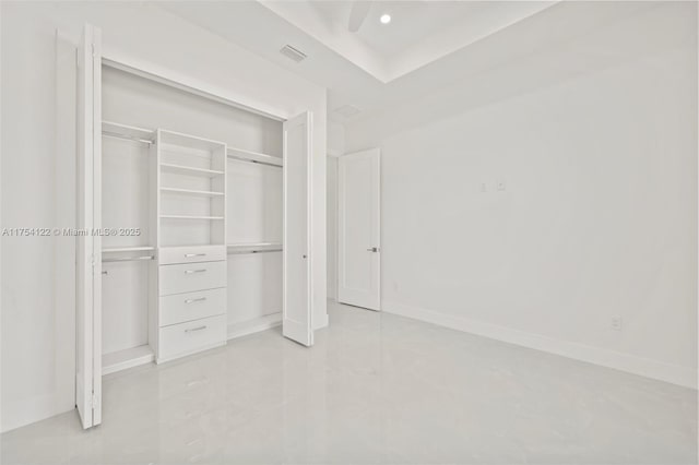 unfurnished bedroom with visible vents, baseboards, a closet, and recessed lighting