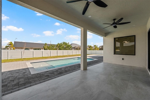 view of swimming pool featuring a fenced backyard, a fenced in pool, and a patio