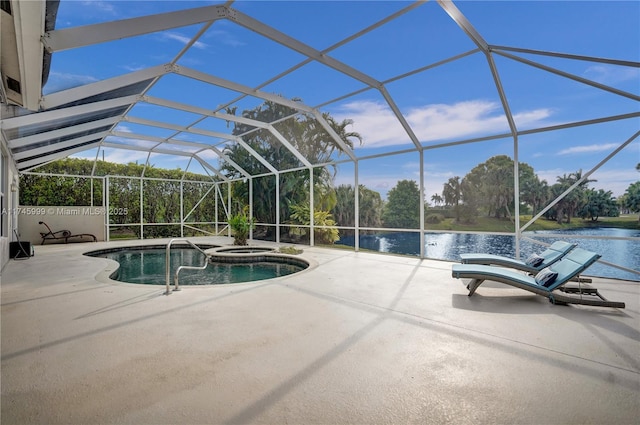 view of swimming pool featuring glass enclosure, a patio area, and a water view