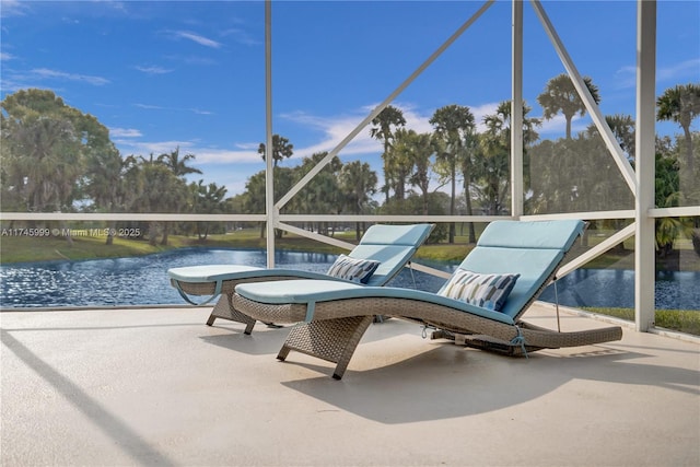 sunroom with a water view