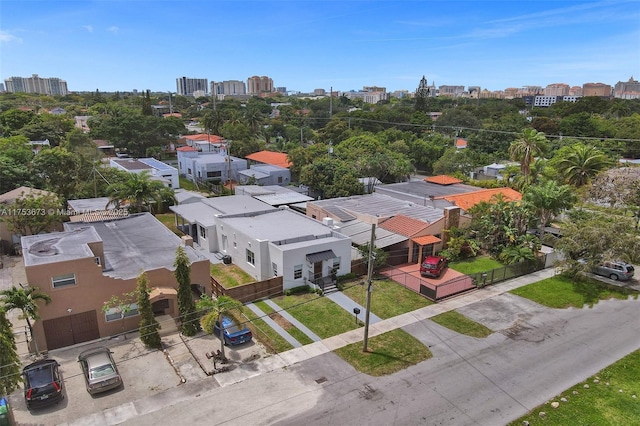 birds eye view of property featuring a view of city