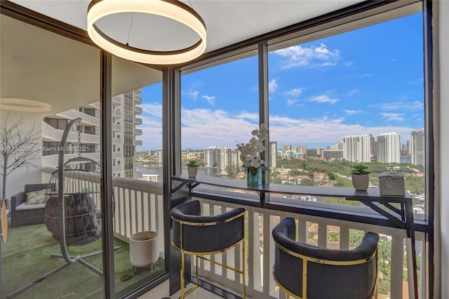 unfurnished sunroom with a city view