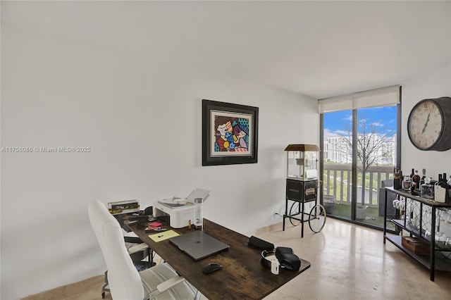 home office with floor to ceiling windows