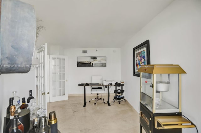 office with french doors and visible vents