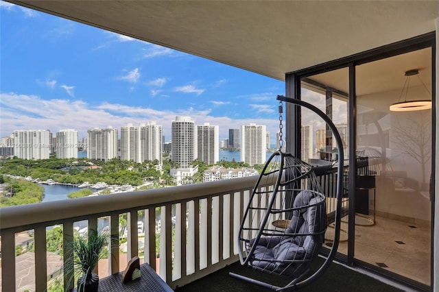 balcony with a city view and a water view