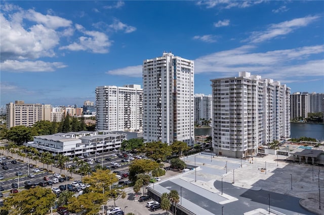 property's view of city featuring a water view