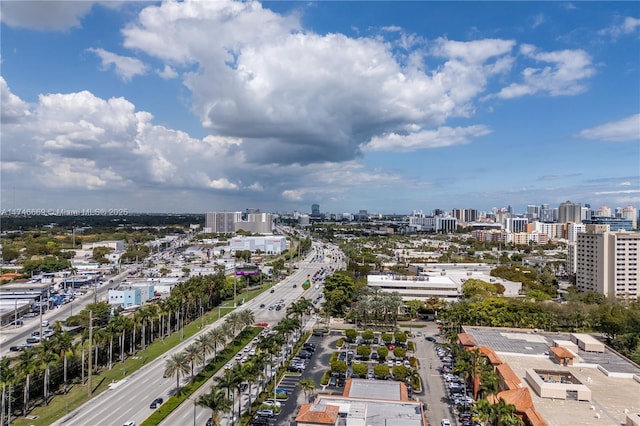 birds eye view of property featuring a city view