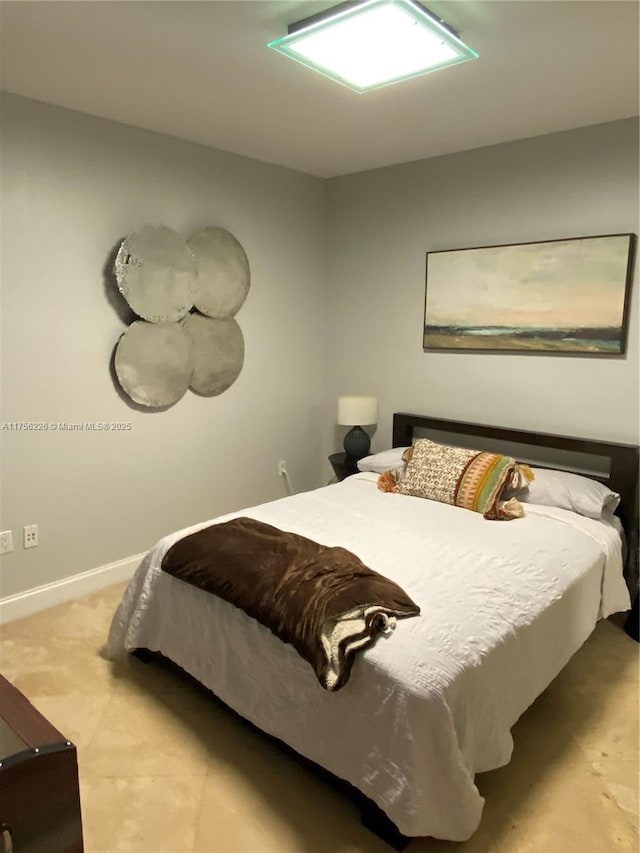 bedroom with baseboards