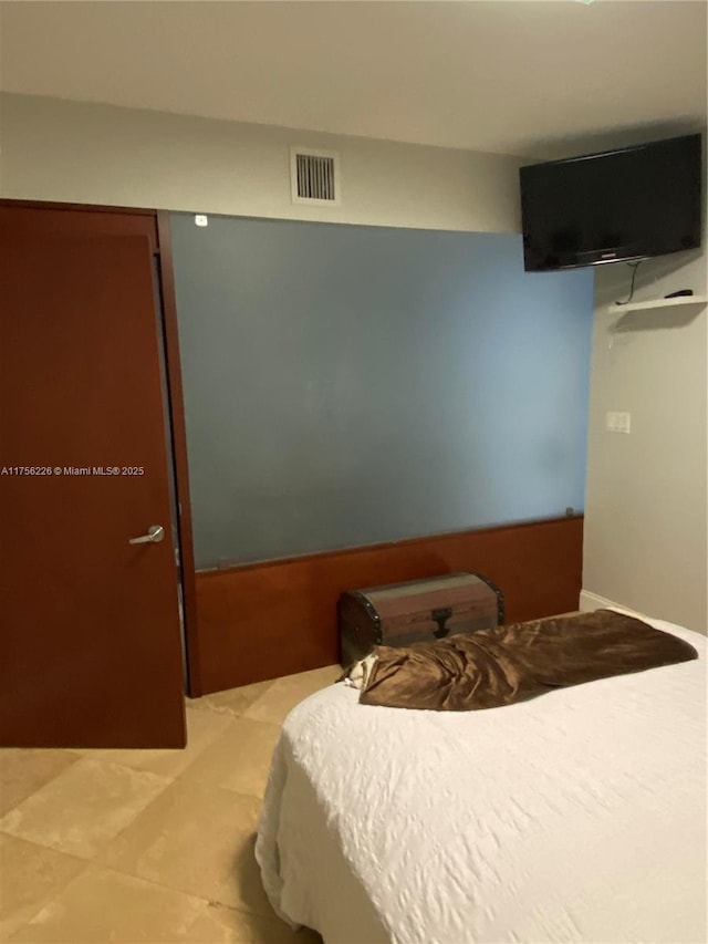 bedroom with visible vents