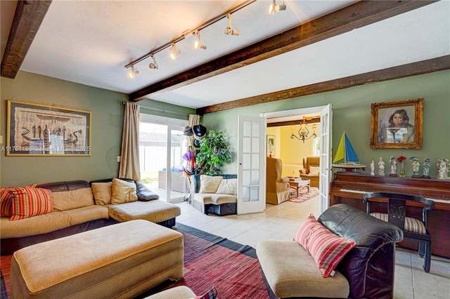 living room with french doors, beamed ceiling, and light tile patterned flooring