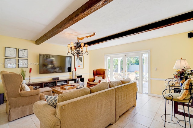 living room featuring beam ceiling, a notable chandelier, light tile patterned floors, and french doors