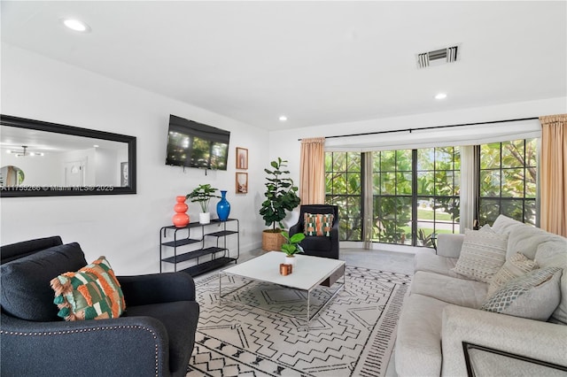 living room with visible vents and recessed lighting